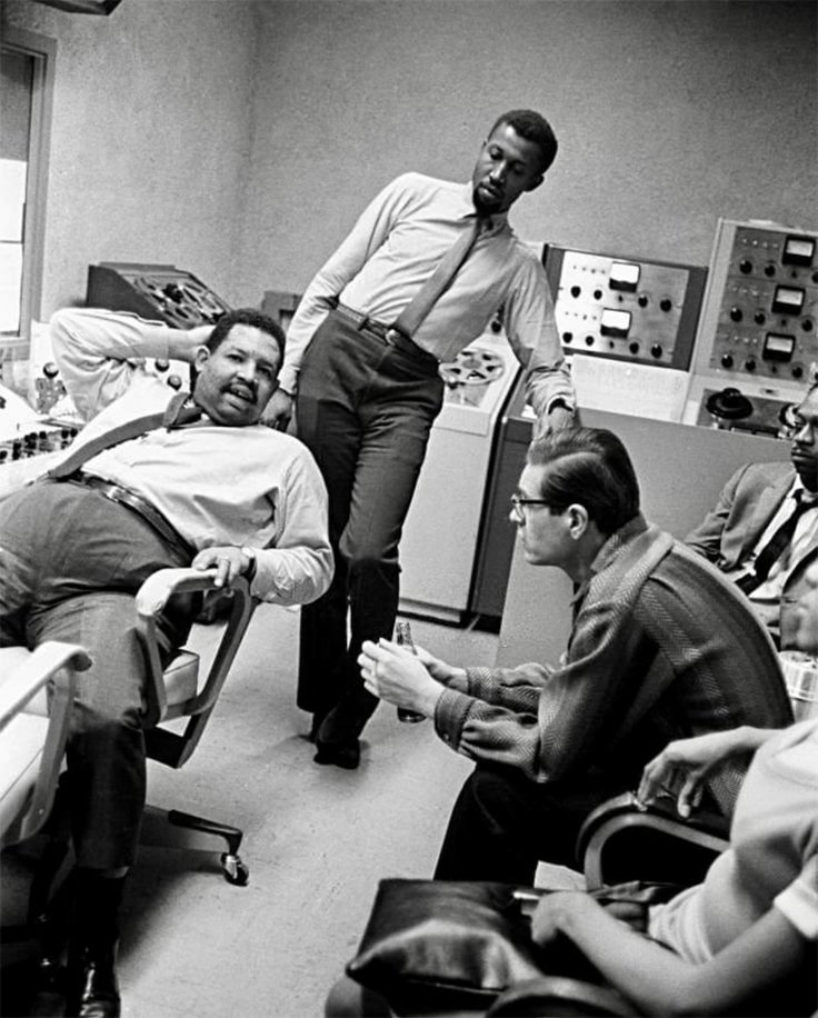 Cannonball (Julian) Adderley American Jazz musician with Bill Evans (standing) in studio with Ampex reel tape recorders